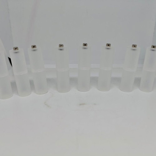 Battery adapters AA to C set of 8, like new, plastic transparent