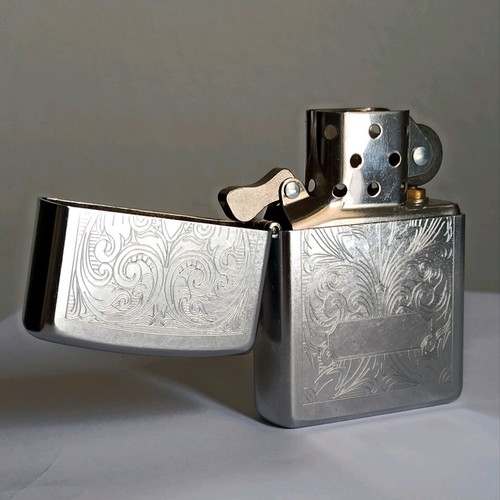 Zippo vintage lighter 2003, new, embossed design