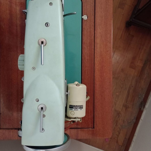 Ideal sewing machine used, foot-powered with motor, wooden cabinet