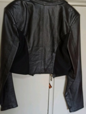Women's leather jacket used, combined with fabric