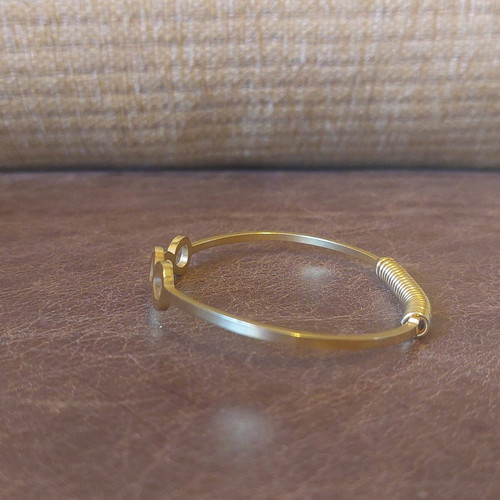 Gold infinity handcuff bracelet like new