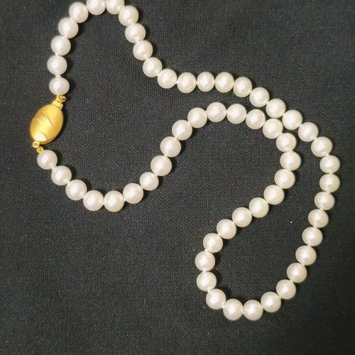 Pearl necklace new with 14K gold clasp