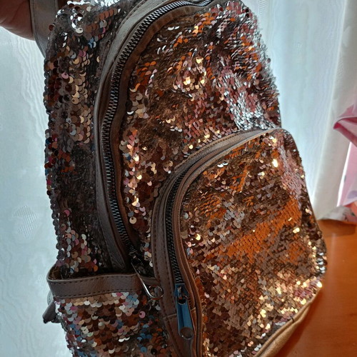 Lame backpack like new, silver