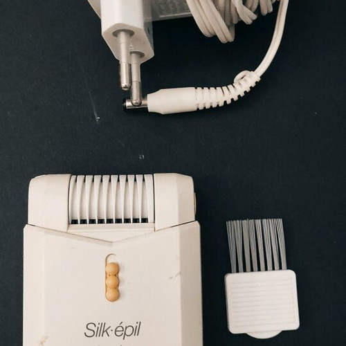 Silk epil duo plus Braun epilator used with charger and cleaning brush