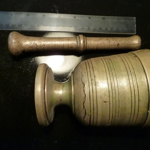 Antique bronze mortar with pestle used