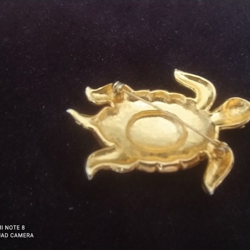 Turtle vintage brooch with large green emerald-like stone, like new