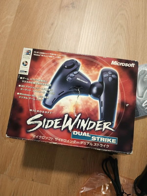 Microsoft Sidewinder Dual Strike gamepad used with CD