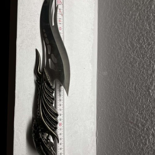 Decorative knife set with ornate handles