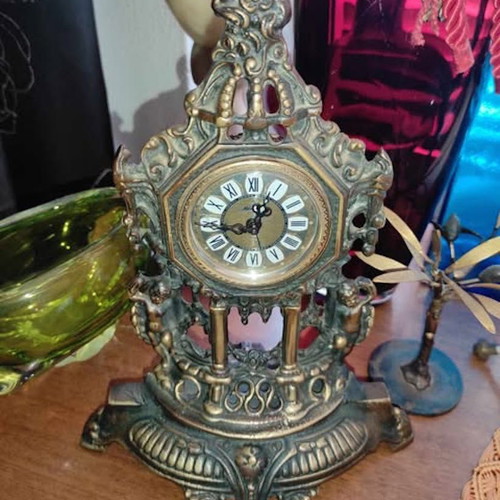 Vintage baroque brass mechanical mantel clock.