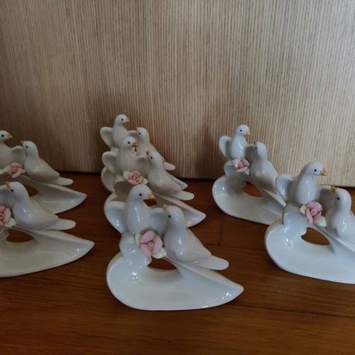 Porcelain decorative doves new, set of 7 pieces