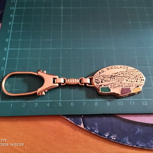 Metal souvenir keychain of Crete in copper tone