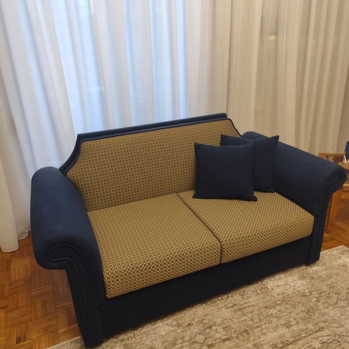 Living room set like new with sofa bed, loveseat with storage, and armchair