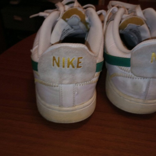 Nike low athletic shoes used, size 43, white with leather