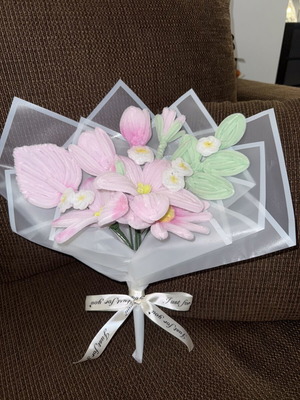 Handmade aromatic flower bouquet in pink shades with waterproof wrapping