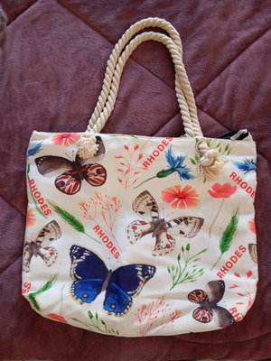 Beach bag like new, waterproof, colorful backpack style