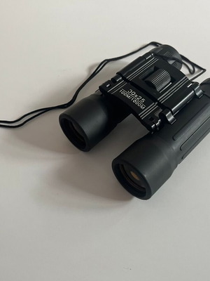 Portable binoculars 30x25 like new with case