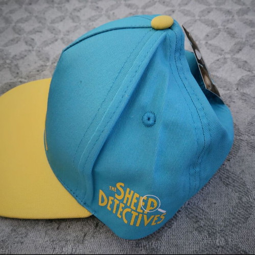 Children's Hat Οι μαλλιαροι ντετέκτιβ new, unused, yellow and turquoise