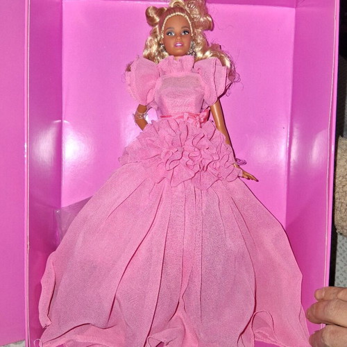 Barbie doll collectible like new with stand