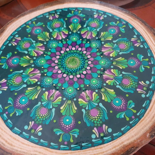 Handpainted wooden decorative plate with mandala design