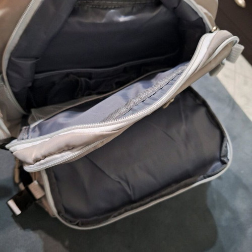 Backpack new, gray with multiple compartments and USB port