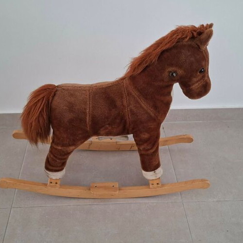 Plush rocking horse used with wooden base