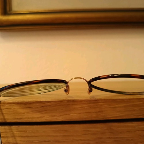 Eyeglasses used, very lightweight, gold color