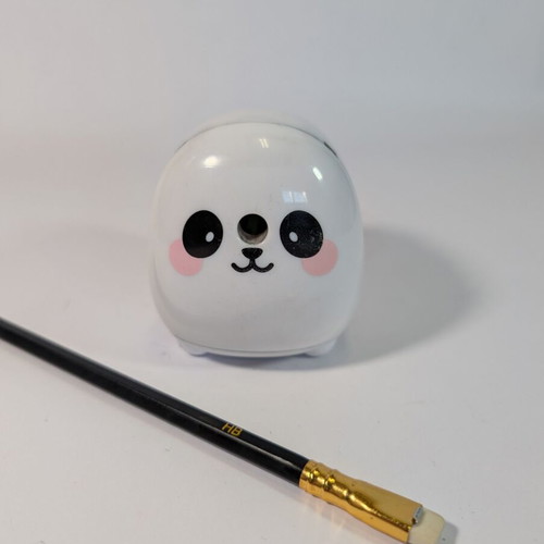 Sharpener with crank used with free pencil