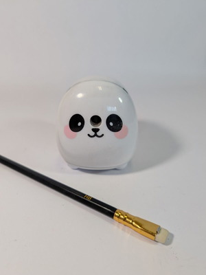 Sharpener with crank used with free pencil