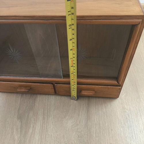 Vintage cabinet restored with engraved glass
