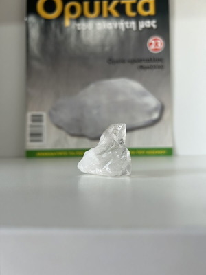 Oreia crystal with related magazine issue
