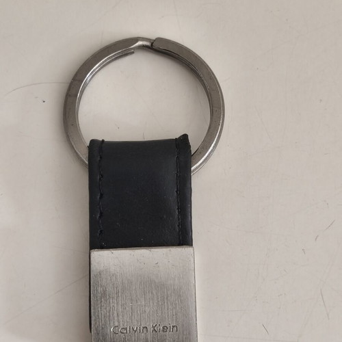 Calvin Klein leather keychain like new with steel details and embossed logo