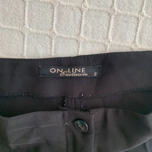 On Line women's black pants used, sizes M/L