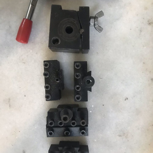 Automatic tool holder for small lathe used with 4 clamps
