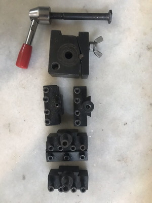 Automatic tool holder for small lathe used with 4 clamps