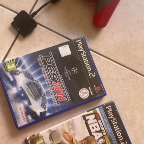 PlayStation 2 controller like new with NBA2K10 and PES2014 games