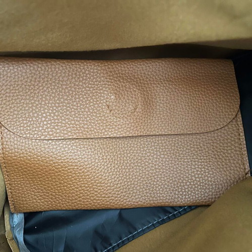 Brown shoulder bag with flap used