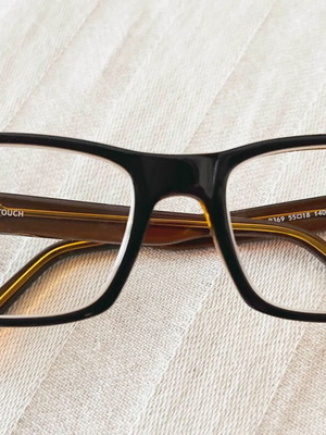 Touch eyeglasses like new, brown frame with gold interior