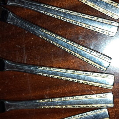 Solingen cutlery set incomplete with gold border on handles, used