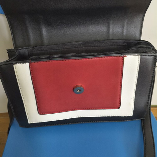 Shoulder bag with adjustable strap, black and red