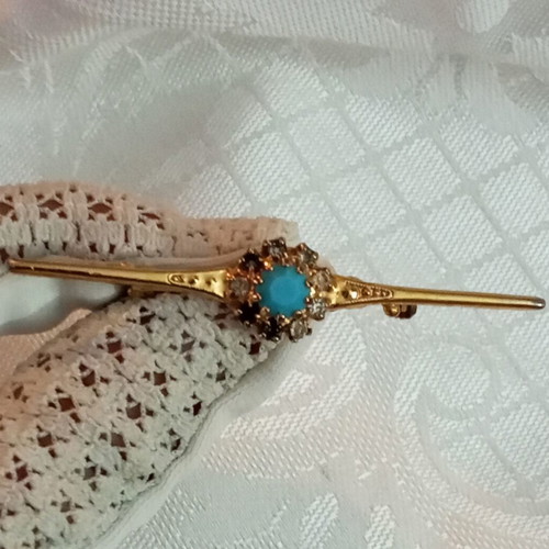 Vintage brooch with zircon and turquoise bead, used