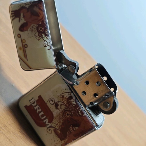 Drum promotional lighter used, functional, collectible