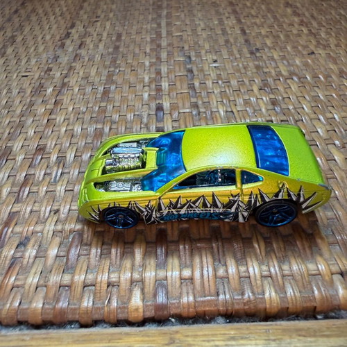 Hot Wheels Mattel Overbored 454 used green car with black/white spikes