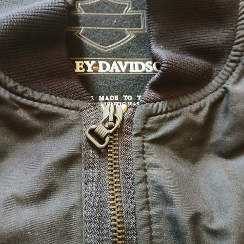 Harley-Davidson men's jacket used with quilted lining and orange details