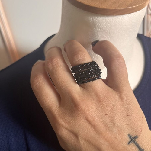 Ring spiral with black beads like new