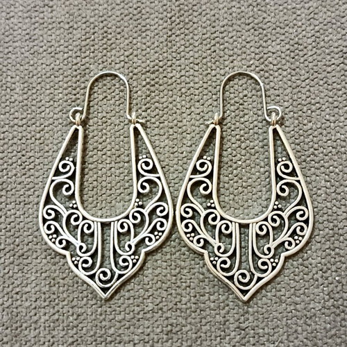 Set of six pairs of earrings new, three dangling and three small