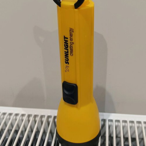 Sunlight Led flashlight with fresh alkaline D batteries new