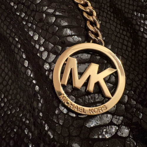 Michael Kors women's shoulder bag used, black with gold details