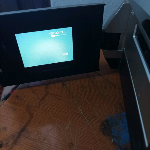 Hitachi video camera used with foldable screen and VHS cassette