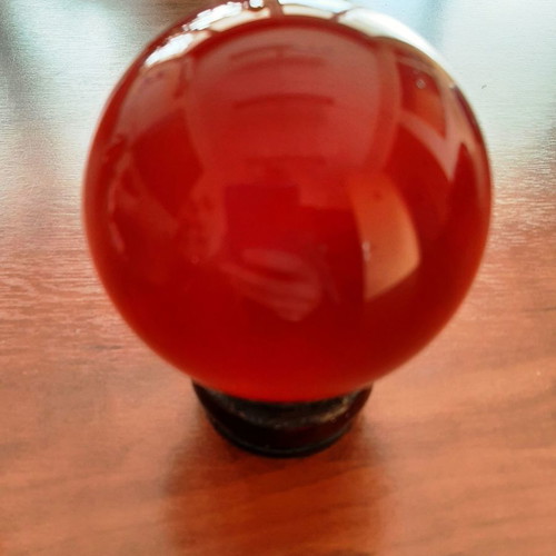 Indian crystal sphere red color on wooden base new