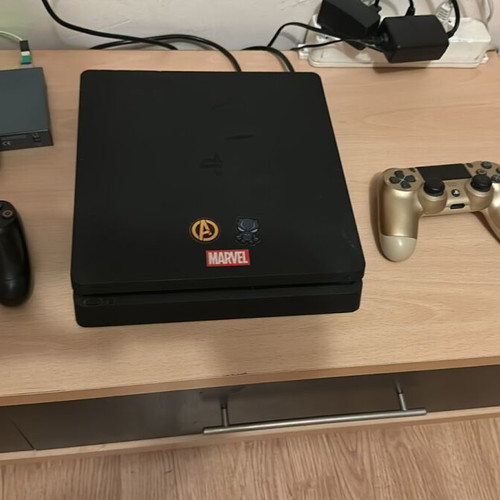 PlayStation 4 Slim console like new with 2 controllers and 3 games